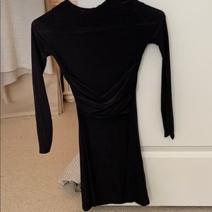 long sleeve black dress w detailing around waste